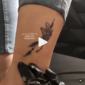 تاتو ظریف پروانه روی ساق پا