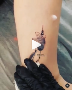 تاتو پر و پروانه روی ساق پا